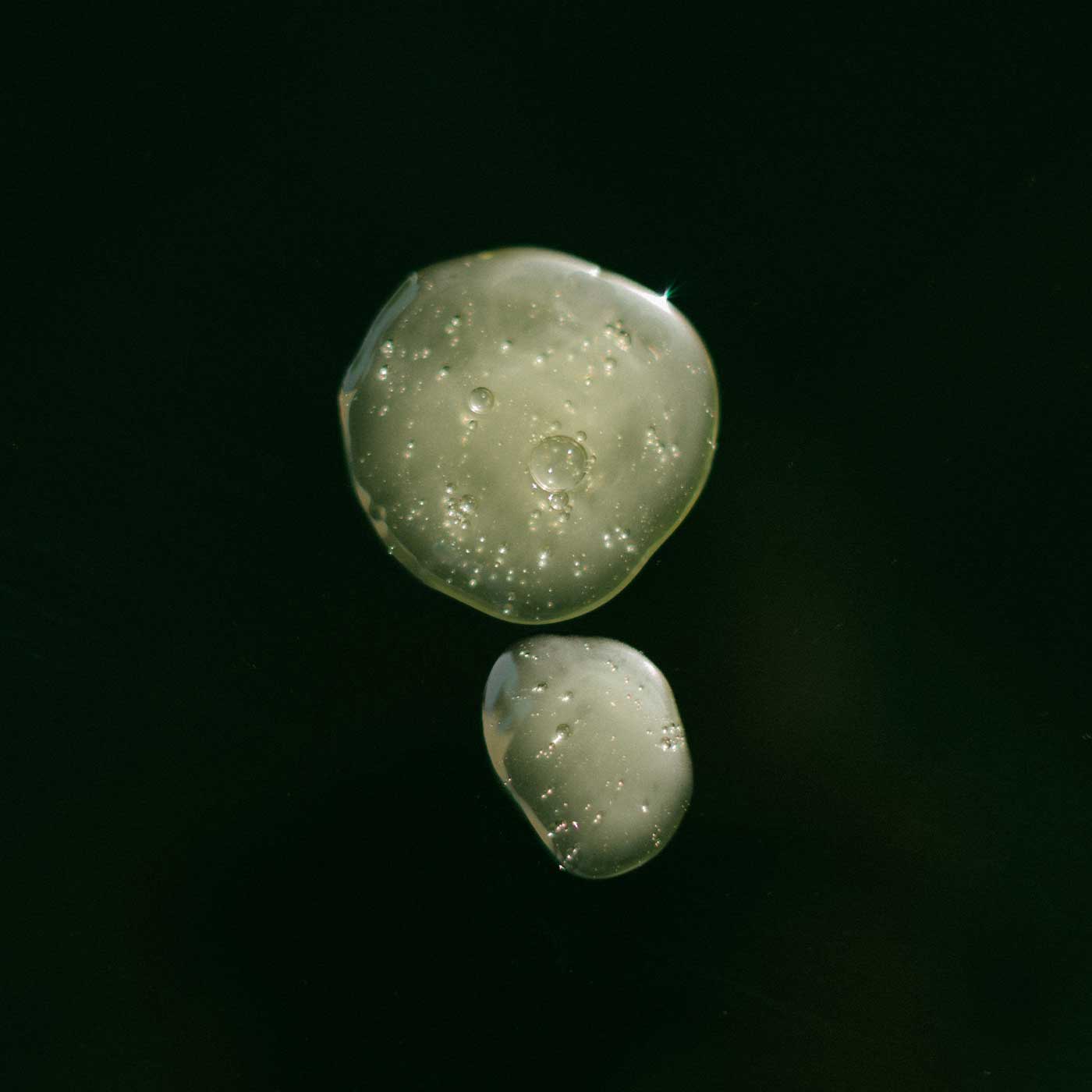 4-elephants_drops-on-black-surface_1400x1400@2x