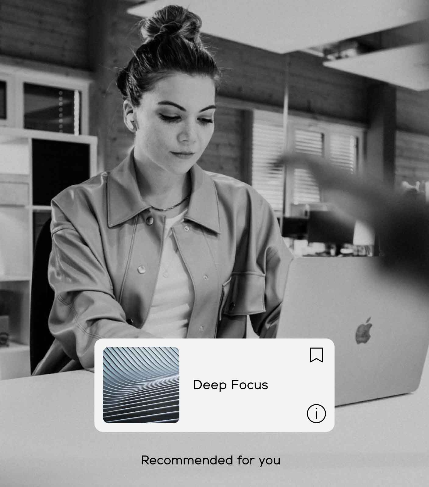 A user interface element showing the deep focus channel placed on an image of a woman working on her laptop.
