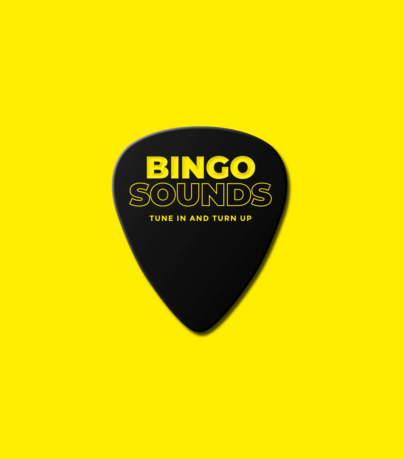 A black guitar plectrum with the bingo sounds logo in yellow lying on a yellow background.